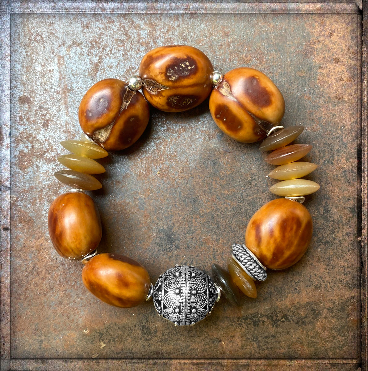 Armband Samenkugeln Cognacfarben Ethno Boho Horn Silber Unikat Dehnbar