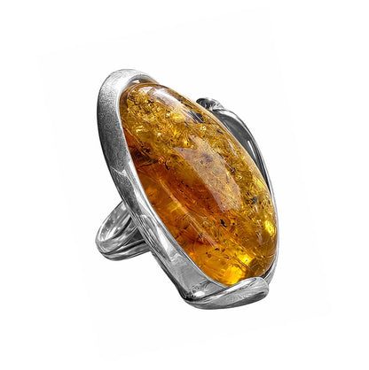Bernsteinring Unikat 925 Silber Oval Geschwungene Silberfassung Größenverstellbare Ringschiene Seitenansicht