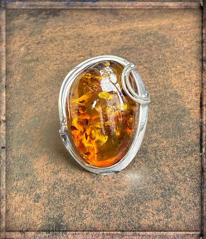 Bernsteinring Unikat Sterling Silber Oval Cognac Geschwungene Silberfassung Größenverstellbare Ringschiene
