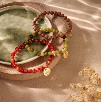 Biba Armbaender Naturstein-Perlen 6 mm Vergoldet Dehnbar