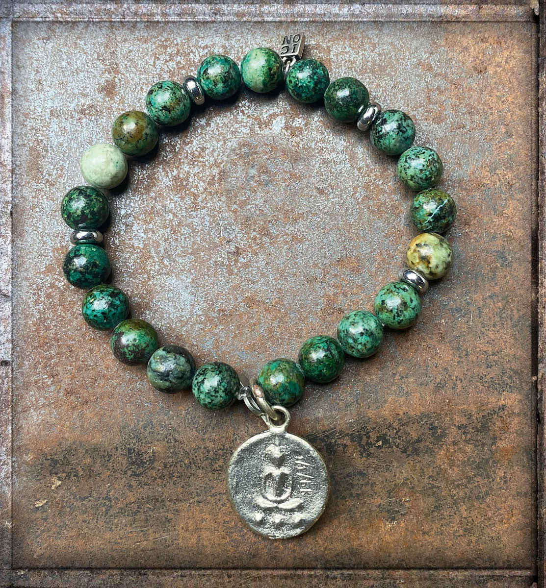 ICON Design Living Armband Buddha-Anhänger Shanti Versilbert Afrikanischer Türkis
