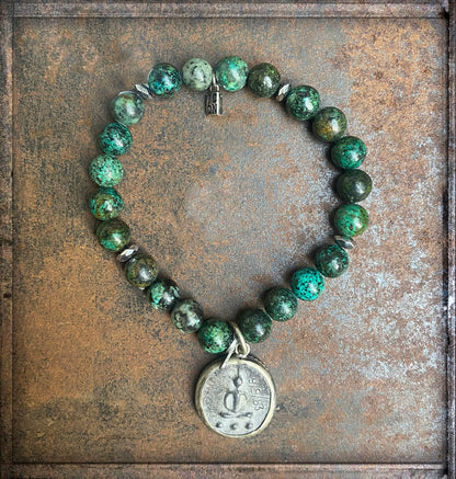 ICON Design Living Armband Buddha-Amulett Rund Afrikanischer Türkis 8 mm Dehnbar