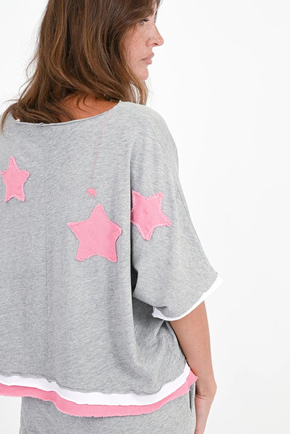 Love Joy Victory T-Shirt Rumbia Stern-Patches Grau Pink Bio-Baumwolle
Model 1