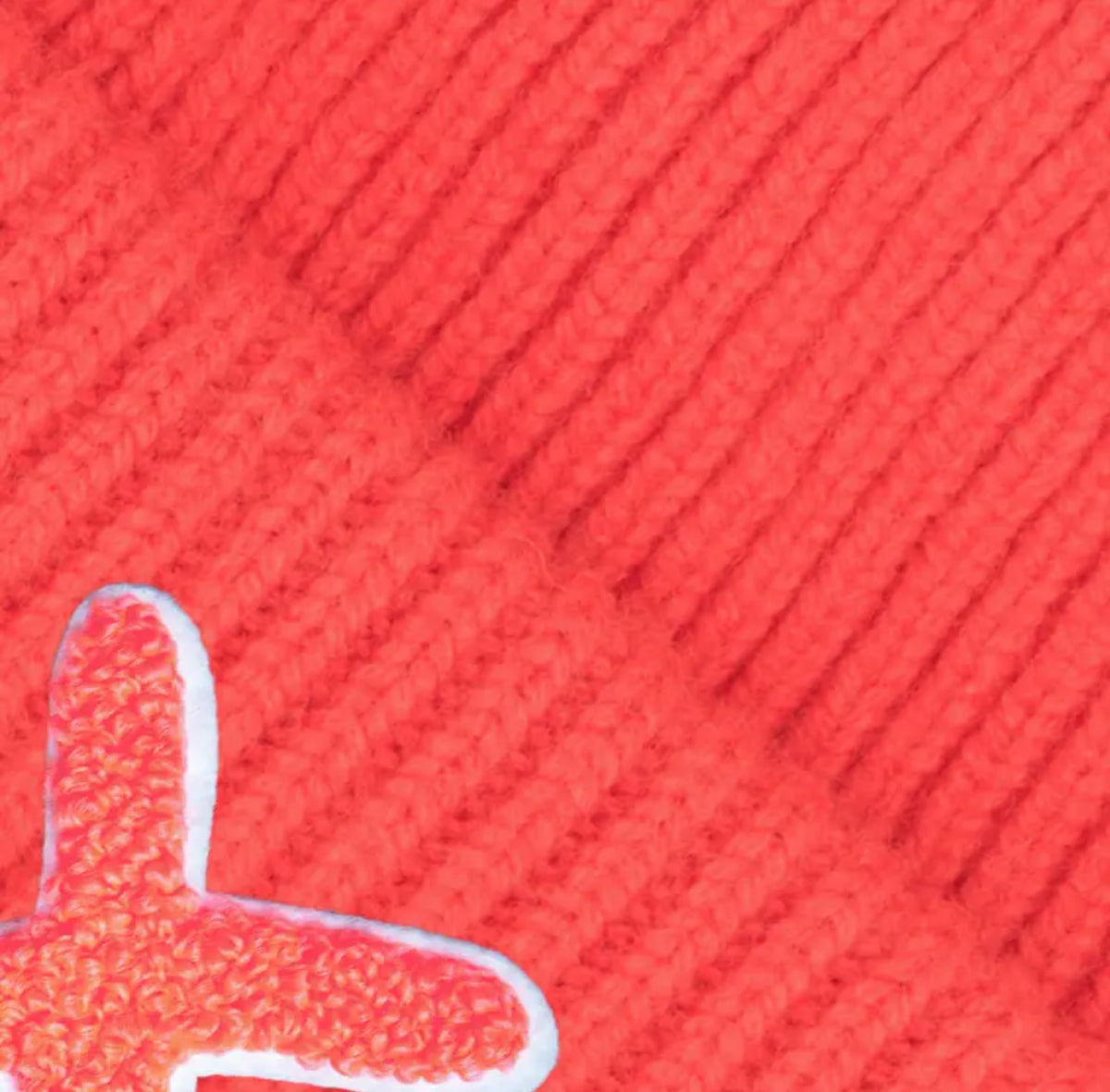 UNIO Strickmütze Lumi X Merinowolle Cashmere Nachhaltig Fair Produziert X-Patch Orange Detail